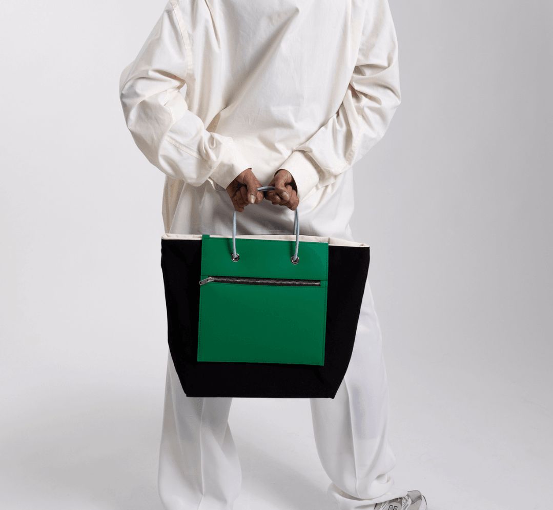 Un Sac à main vert - noir de fourre-tout réversible et de grande capacité