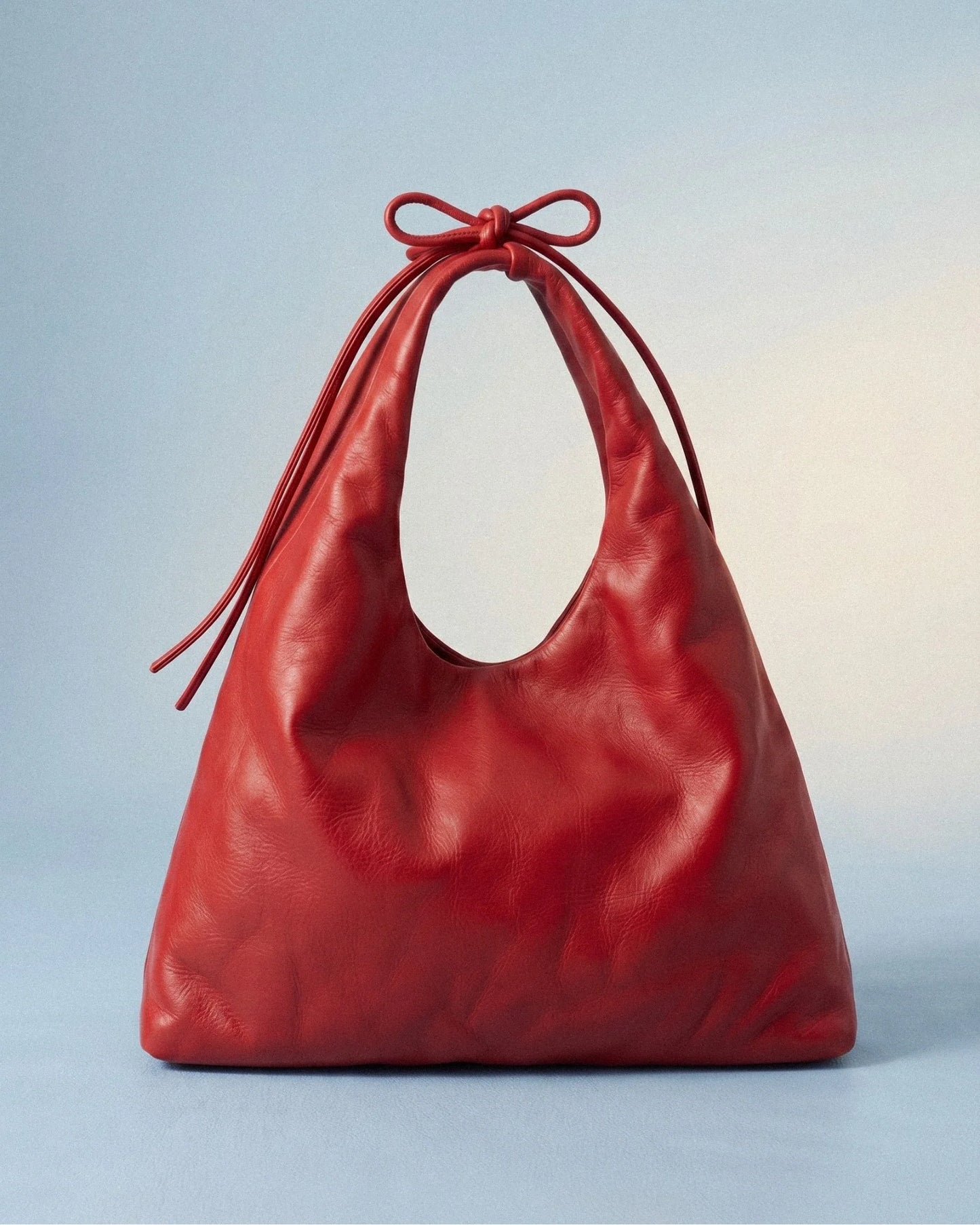 Sac hobo LOLES cuir tanné végétal coloris rouge – Bmassy