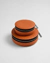 Dos du mini sac rond en cuir orange Almita Mini