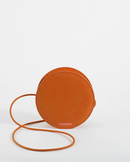 Mini sac rond orange en cuir végétal artisanal – Bmassy
