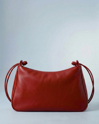 Mariloli, grand sac en cuir rouge avec cordon de serrage, vue de face – bmassy