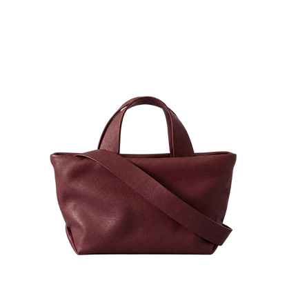 Sac Juanita en cuir bordeaux, vu de face avec ses poignées et sa bandoulière, Bmassy.