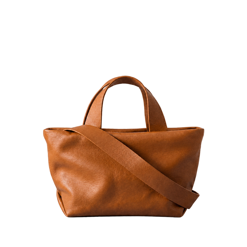 Sac Juanita en cuir orange terre cuite, vu de face avec sa bandoulière, Bmassy.