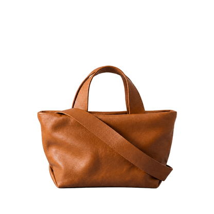 Sac Juanita en cuir orange terre cuite, vu de face avec sa bandoulière, Bmassy.