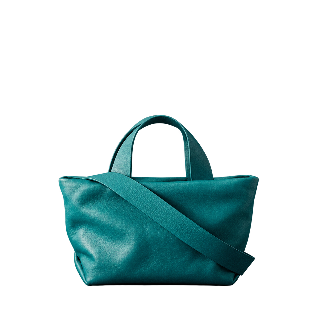 Sac Juanita en cuir turquoise, vu de face avec sa bandoulière, Bmassy.