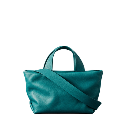 Sac Juanita en cuir turquoise, vu de face avec sa bandoulière, Bmassy.