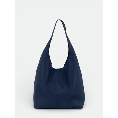 Sac porté épaule bleu avec anse large intégrée, vu de face sur fond clair