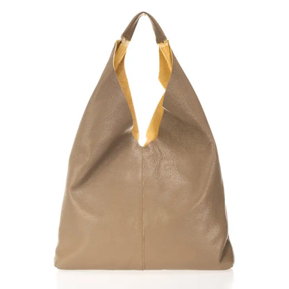 Sac shopper en cuir beige en bois vu de face, avec intérieur ocre visible